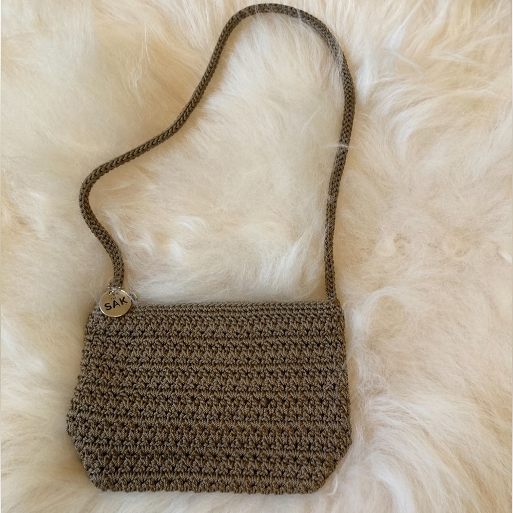 The SAK beige knit purse, like new condition, no stains